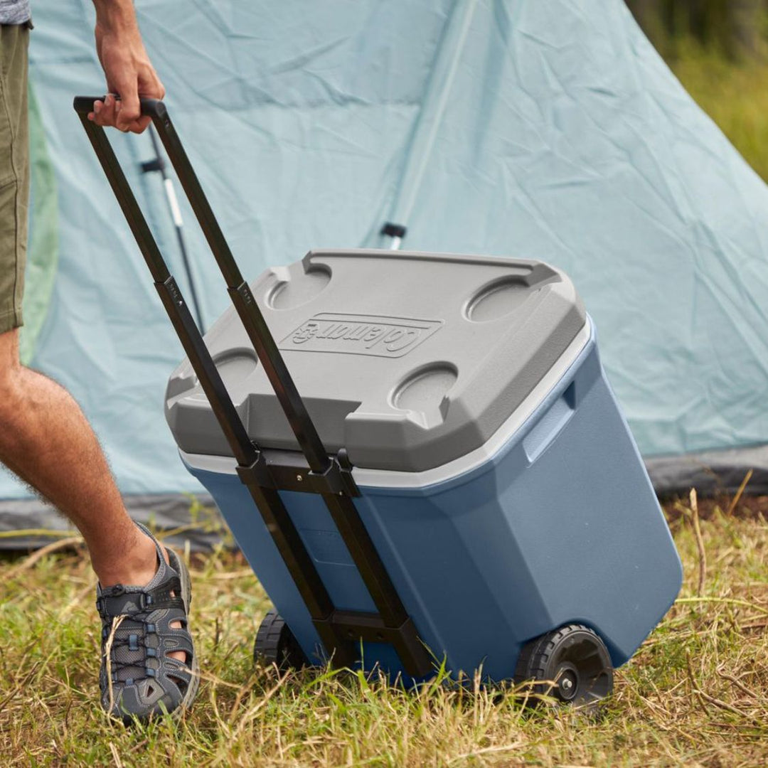 Coleman - Glacière à roulettes rigides, avec poignée, 61,5 L, bleu